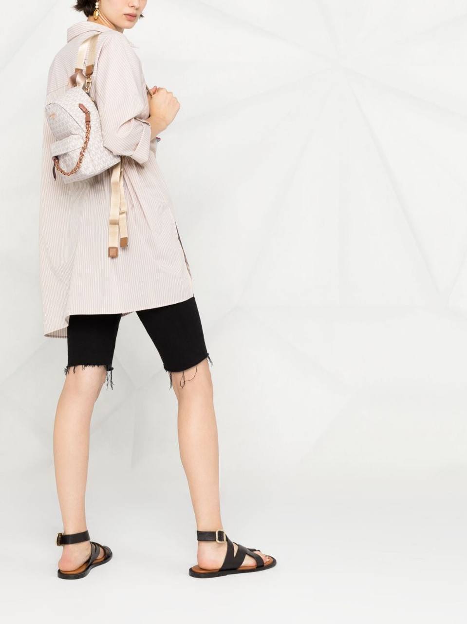 Michael Kors Small Rhea Monogram print backpack in offwhite