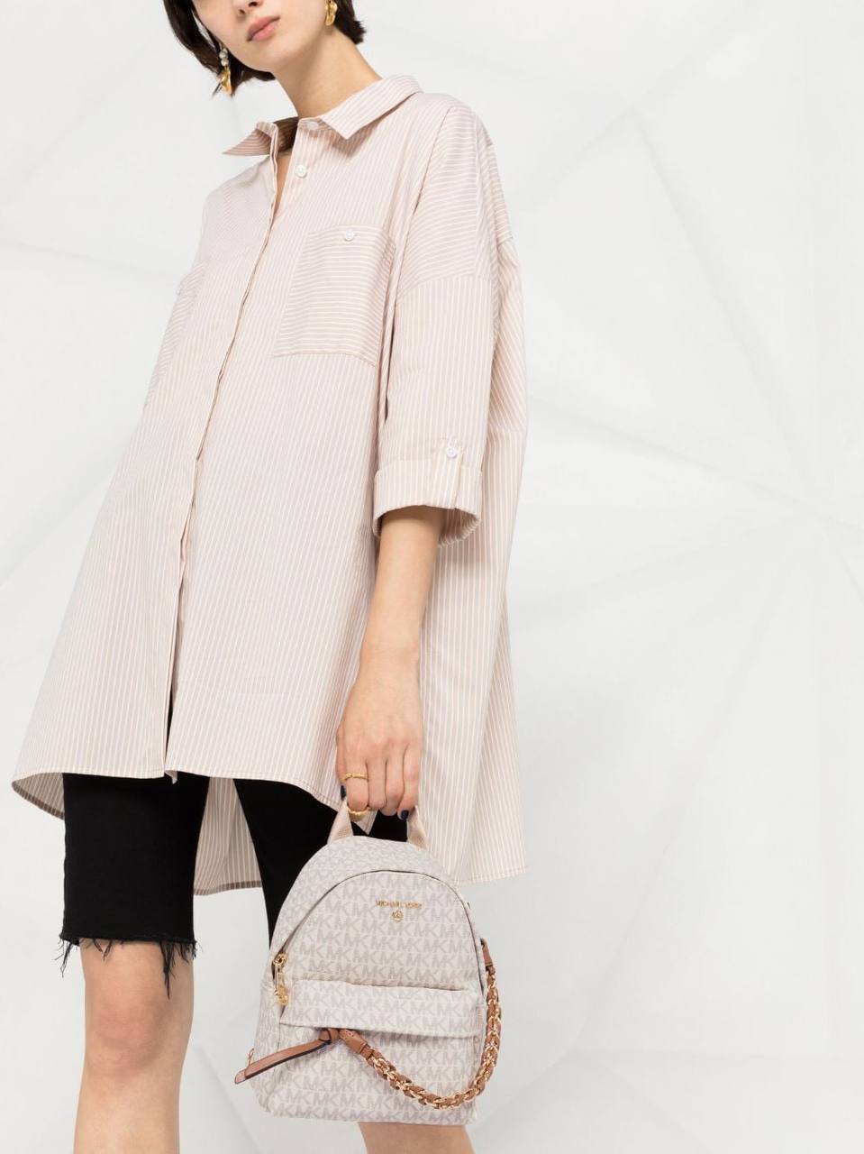 Michael Kors Small Rhea Monogram print backpack in offwhite