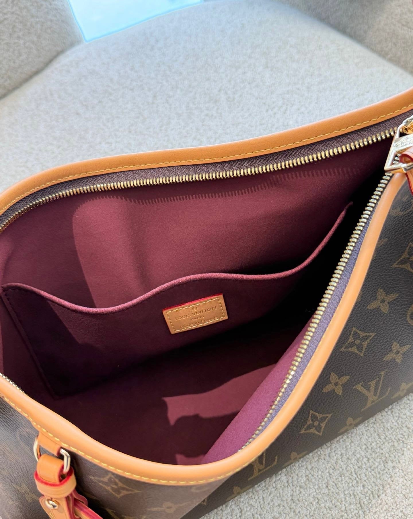 LOUIS VUITTON CARRYALL EAST WEST BAG
