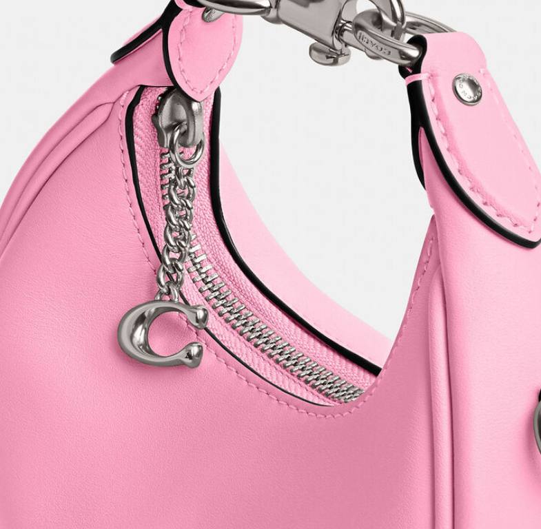 Discover the Elegance of the Pink Jonie Coach Bag