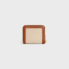 COMPACT ZIPPED WALLET CUIR TRIOMPHE IN TEXTILE AND CALFSKIN