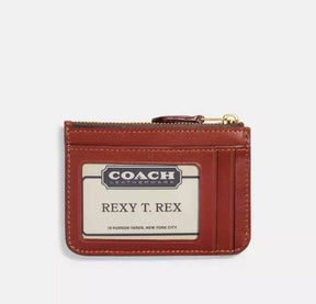 Coach Mini Skinny Id Case In Signature Canvas