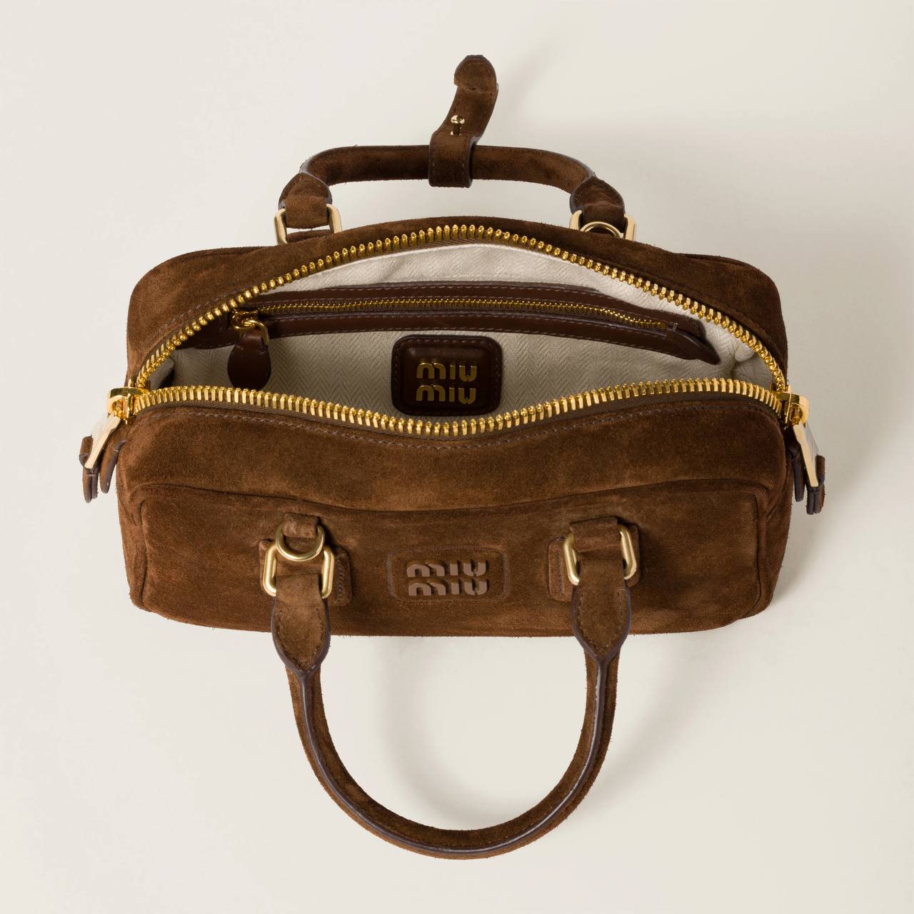 Miu Miu Arcadie padded suede top-handle bag in Cocoa Brown