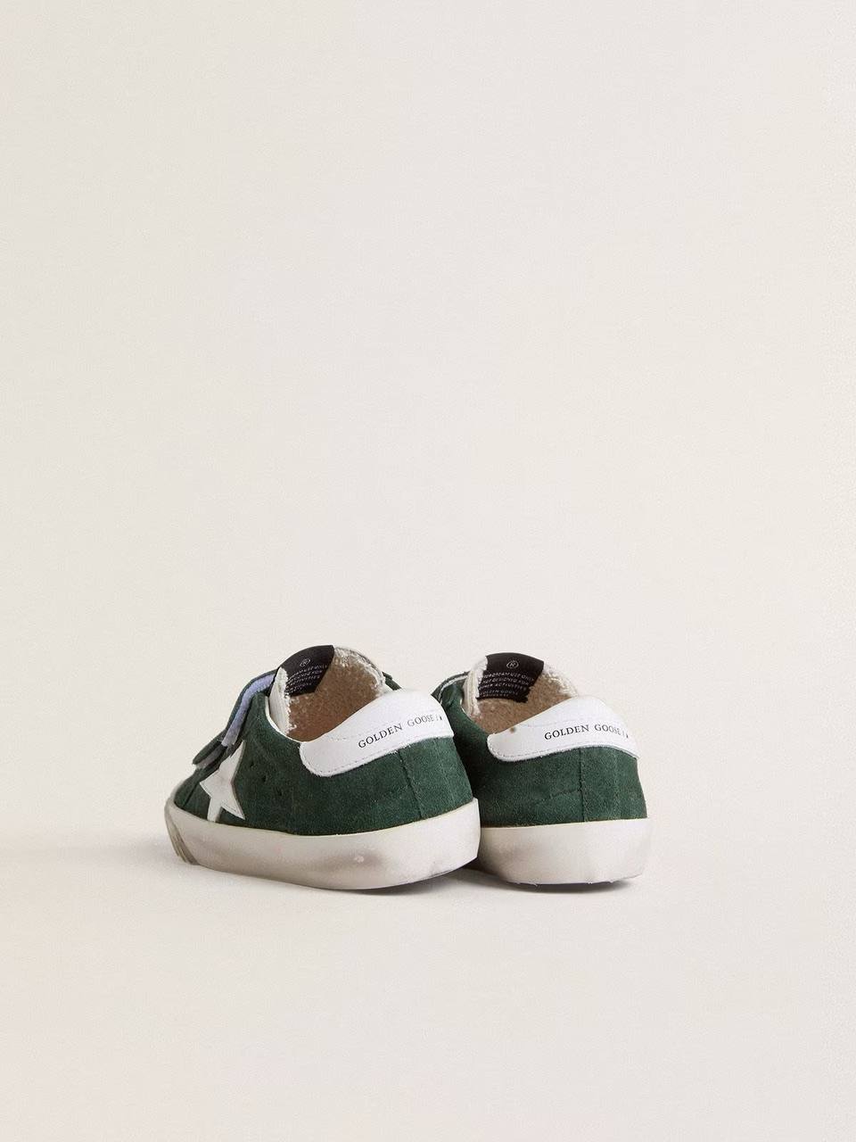 Old School Young in green suede with white leather star and heel tab